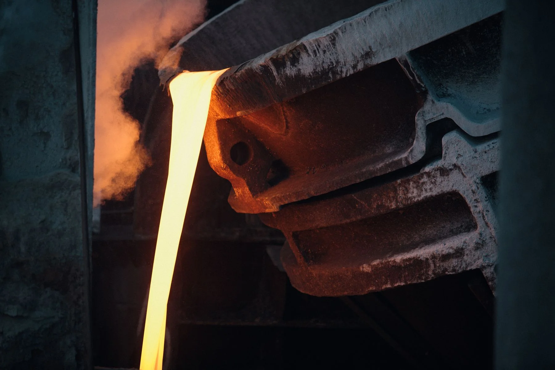 Molten bronze poured at the foundry