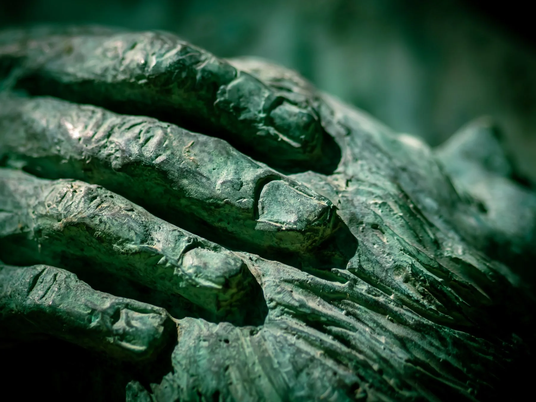 Textured bronze hands