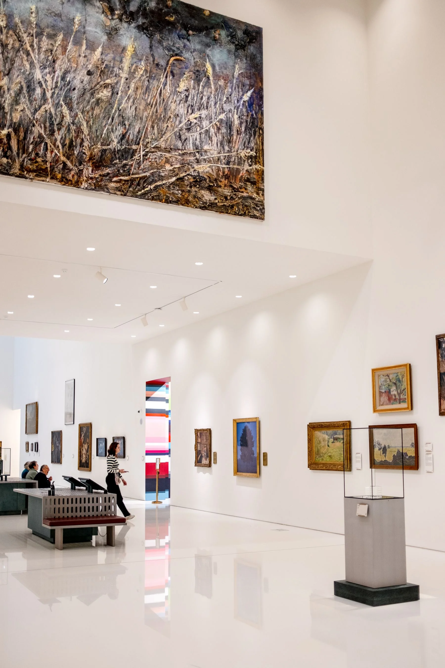 Museum interior with paintings