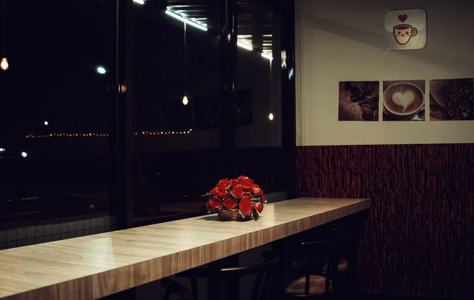 The warm wooden counter of the Ember Roasters café
