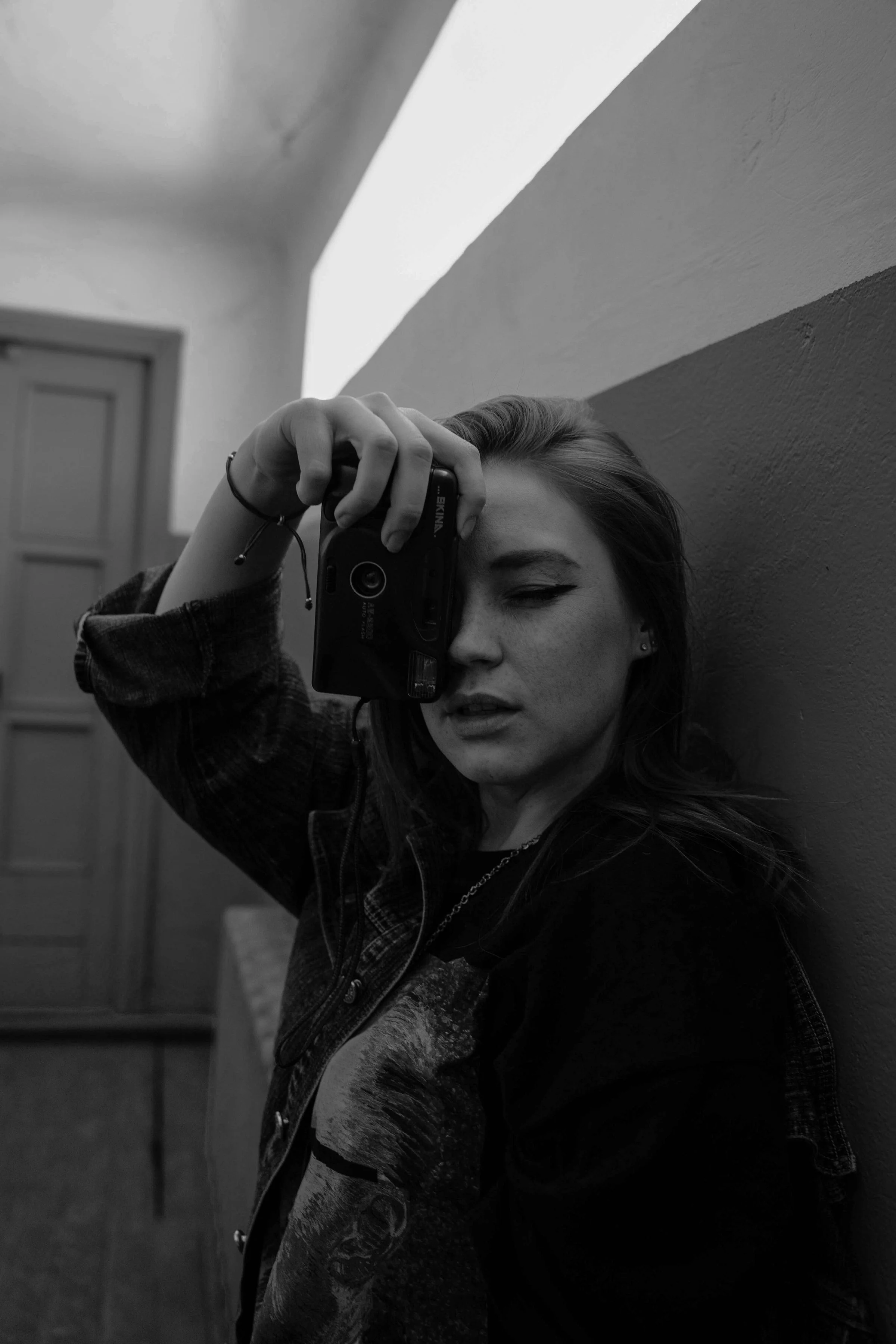 Iris Lund with a film camera