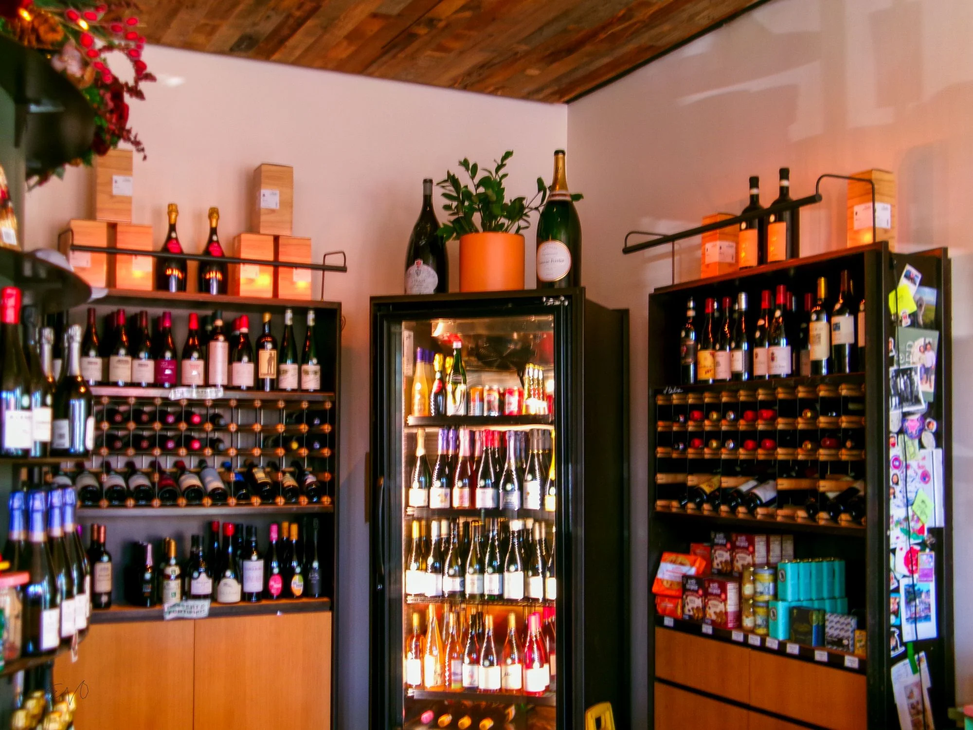 Shelves of wine bottles inside The Cellar Door shop