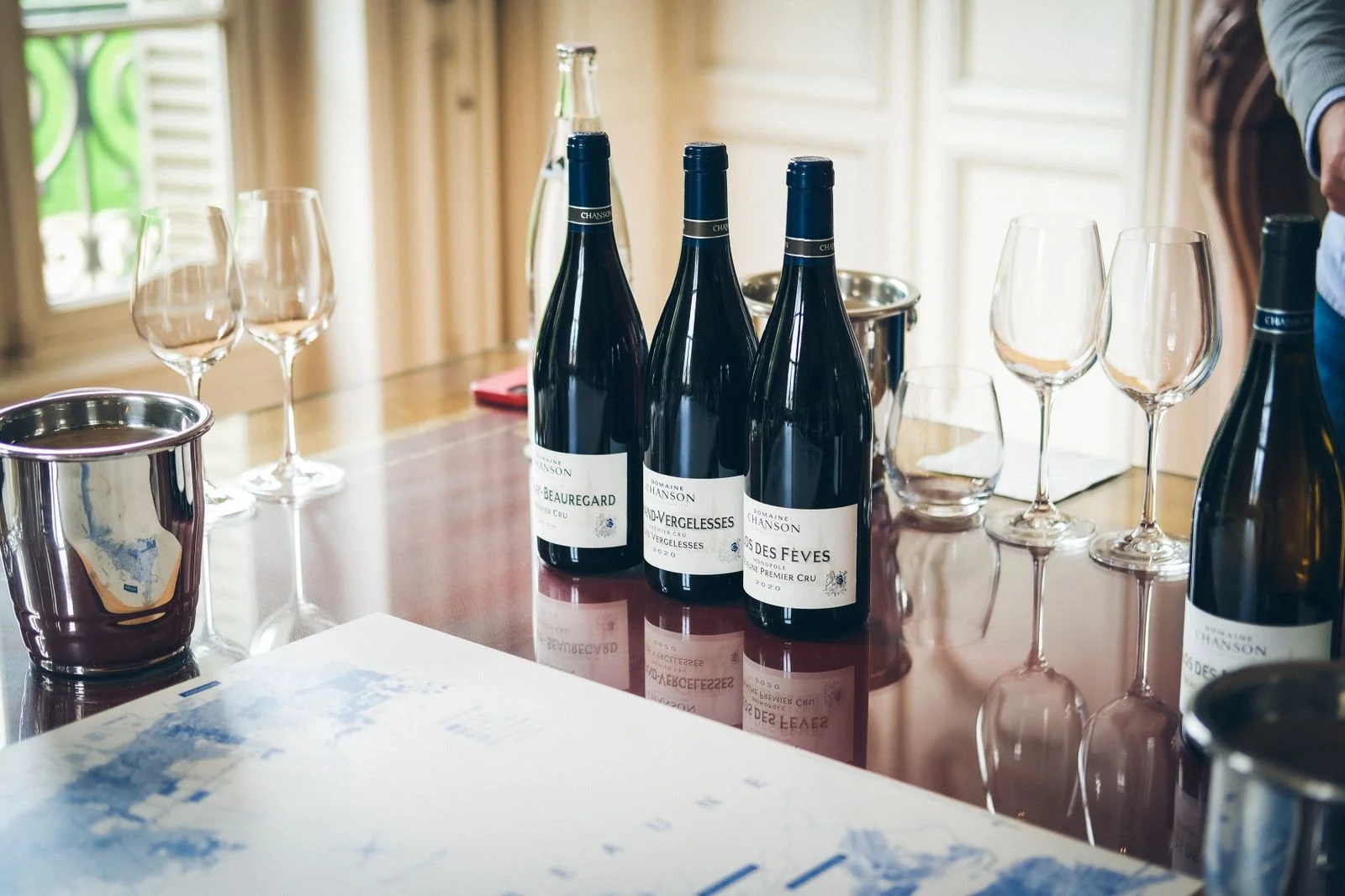 Bottles and glasses set out for a tasting